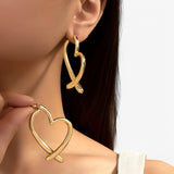 Jewelry : Boucles d'oreilles cœur personnalisées pour femme, polyvalentes et tendance pour toutes les occasions in van Seroa
