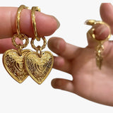 Martha | Eleganti orecchini a forma di cuore retrò - €25 : Boucles d'oreilles en forme de cœur rétro Femme in Couleur or van Seroa