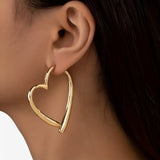 Jewelry : Boucles d'oreilles cœur personnalisées pour femme, polyvalentes et tendance pour toutes les occasions in van Seroa