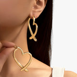 Jewelry : Boucles d'oreilles cœur personnalisées pour femme, polyvalentes et tendance pour toutes les occasions in van Seroa