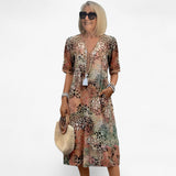 Dresses : Robe Midi Fleurie Estivale Élégante pour Femme - Coupe Fluide et Confortable in Beige van Seroa